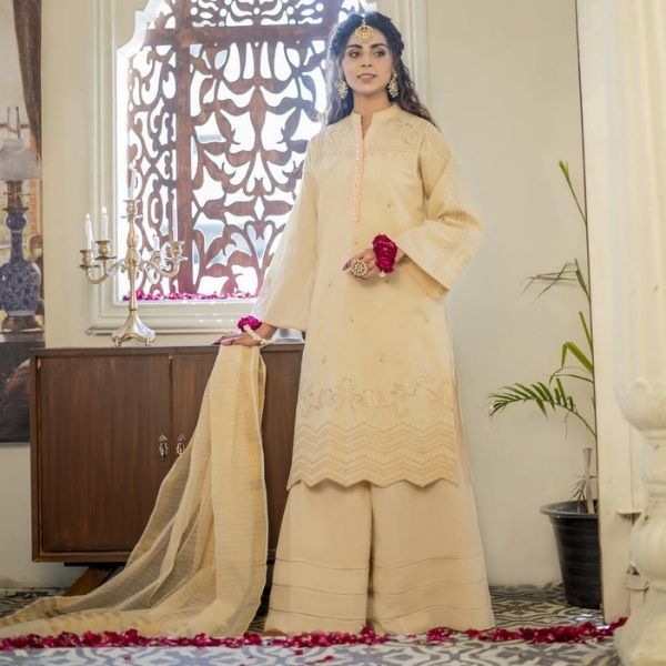 Husn E Nur -  Nuriyaa Self Embroidered Pastel Peach 2 Pcs Outfit Paired with a Sharara 2 